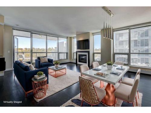 913-222 Riverfront Avenue Sw, Calgary, AB - Indoor Photo Showing Living Room With Fireplace