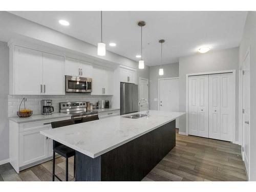 213-370 Harvest Hills Common Ne, Calgary, AB - Indoor Photo Showing Kitchen With Stainless Steel Kitchen With Upgraded Kitchen