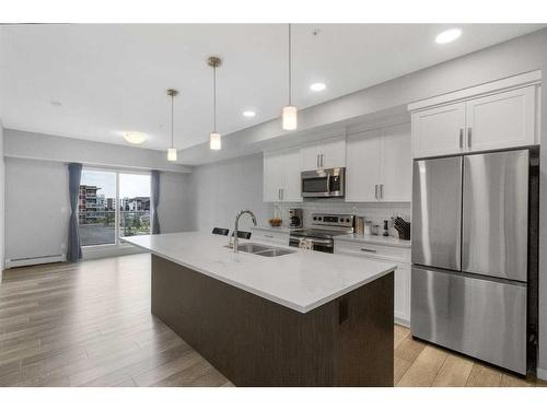 213-370 Harvest Hills Common Ne, Calgary, AB - Indoor Photo Showing Kitchen With Stainless Steel Kitchen With Double Sink With Upgraded Kitchen