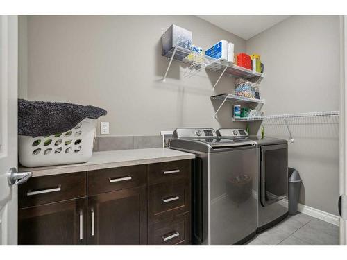 26 Evansborough View Nw, Calgary, AB - Indoor Photo Showing Laundry Room