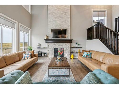 26 Evansborough View Nw, Calgary, AB - Indoor Photo Showing Living Room With Fireplace