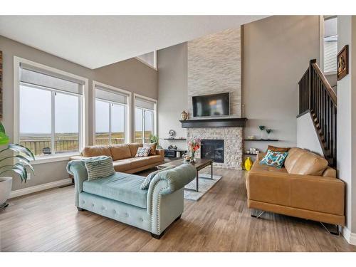 26 Evansborough View Nw, Calgary, AB - Indoor Photo Showing Living Room With Fireplace