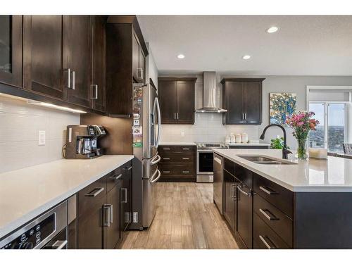 26 Evansborough View Nw, Calgary, AB - Indoor Photo Showing Kitchen With Double Sink With Upgraded Kitchen