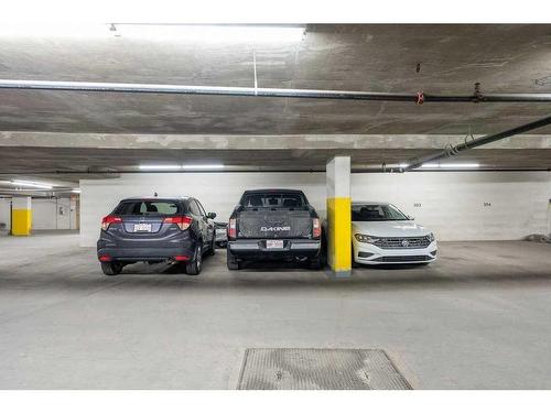 1804-77 Spruce Place Sw, Calgary, AB - Indoor Photo Showing Garage