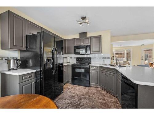 1-2208 29 Street Sw, Calgary, AB - Indoor Photo Showing Kitchen