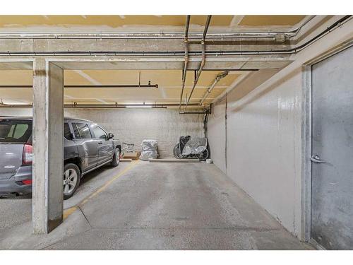 1-2208 29 Street Sw, Calgary, AB - Indoor Photo Showing Garage