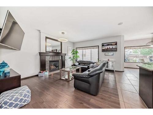 59 Elgin Terrace Se, Calgary, AB - Indoor Photo Showing Living Room With Fireplace