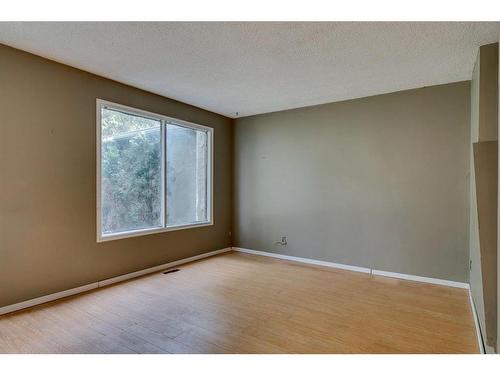 885 Queensland Drive Se, Calgary, AB - Indoor Photo Showing Other Room