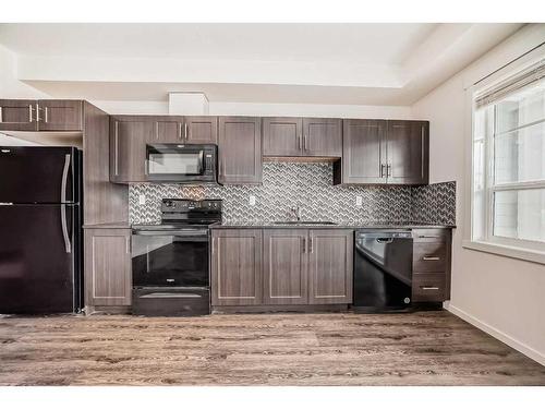 7312-151 Legacy Main Street Se, Calgary, AB - Indoor Photo Showing Kitchen