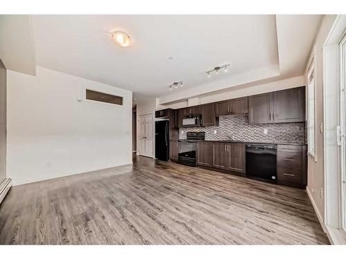 7312-151 Legacy Main Street Se, Calgary, AB - Indoor Photo Showing Kitchen