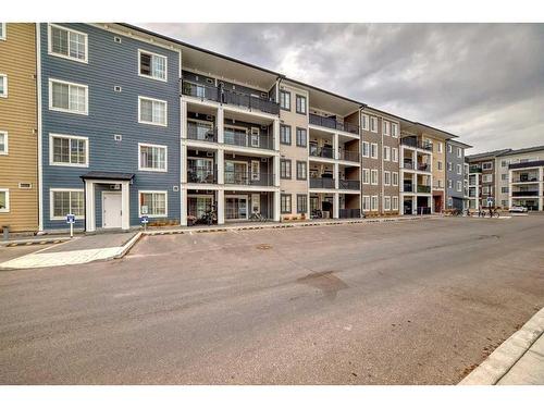 7312-151 Legacy Main Street Se, Calgary, AB - Outdoor With Balcony With Facade