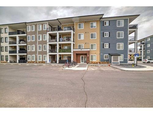 7312-151 Legacy Main Street Se, Calgary, AB - Outdoor With Balcony With Facade