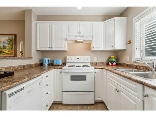 216-630 8 Avenue Se, Calgary, AB - Indoor Photo Showing Kitchen With Double Sink