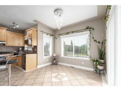 75 West Cedar Rise Sw, Calgary, AB - Indoor Photo Showing Kitchen