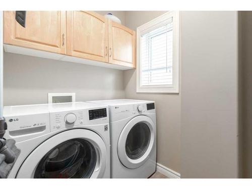 75 West Cedar Rise Sw, Calgary, AB - Indoor Photo Showing Laundry Room