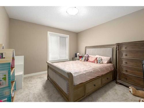 75 West Cedar Rise Sw, Calgary, AB - Indoor Photo Showing Bedroom