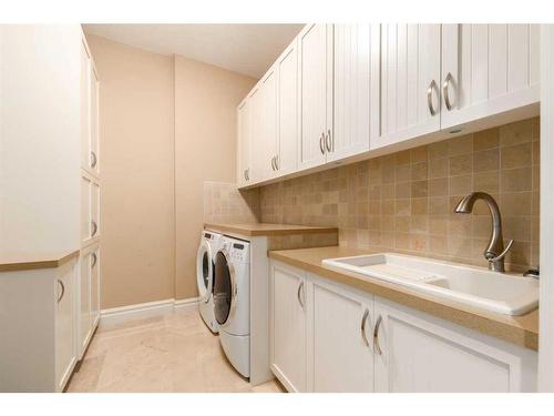 227 Aspen Ridge Place Sw, Calgary, AB - Indoor Photo Showing Laundry Room