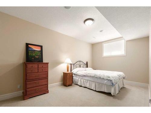 227 Aspen Ridge Place Sw, Calgary, AB - Indoor Photo Showing Bedroom