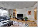 407 Tache Avenue Nw, Calgary, AB  - Indoor Photo Showing Living Room 