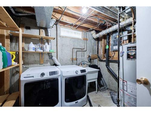 243 Cedarbrae Crescent Sw, Calgary, AB - Indoor Photo Showing Laundry Room