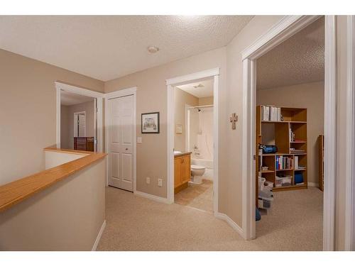 94 Cougar Plateau Way Sw, Calgary, AB - Indoor Photo Showing Other Room