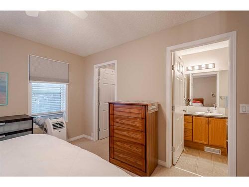 94 Cougar Plateau Way Sw, Calgary, AB - Indoor Photo Showing Bedroom