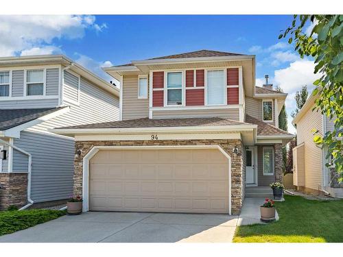 94 Cougar Plateau Way Sw, Calgary, AB - Outdoor