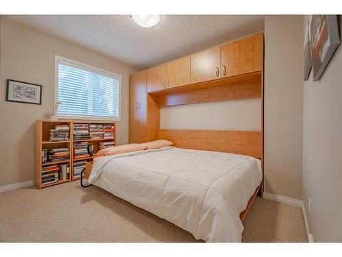 94 Cougar Plateau Way Sw, Calgary, AB - Indoor Photo Showing Bedroom