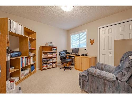 94 Cougar Plateau Way Sw, Calgary, AB - Indoor Photo Showing Office