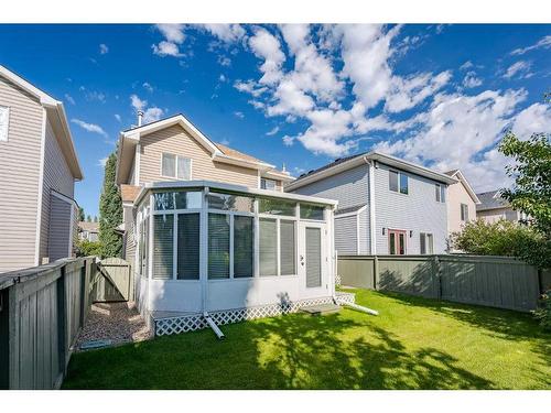 94 Cougar Plateau Way Sw, Calgary, AB - Outdoor