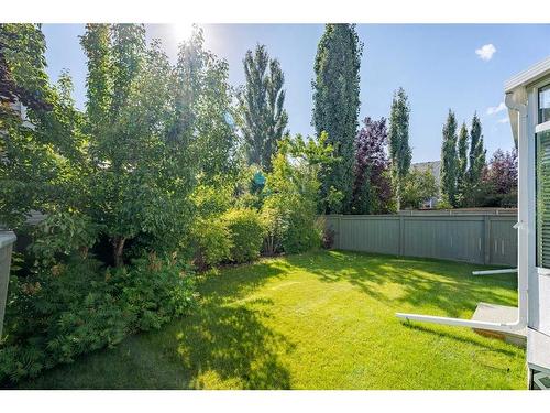 94 Cougar Plateau Way Sw, Calgary, AB - Outdoor With Backyard