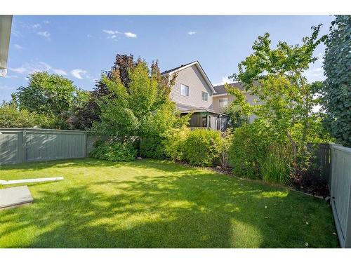 94 Cougar Plateau Way Sw, Calgary, AB - Outdoor With Backyard