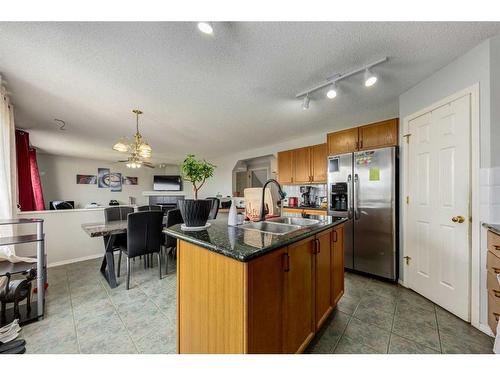 256 Oakmere Place, Chestermere, AB - Indoor Photo Showing Kitchen With Double Sink