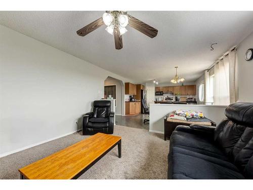 256 Oakmere Place, Chestermere, AB - Indoor Photo Showing Living Room