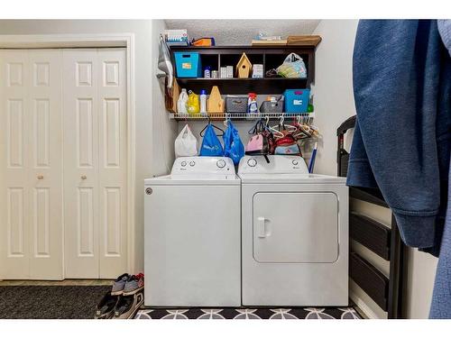 256 Oakmere Place, Chestermere, AB - Indoor Photo Showing Laundry Room