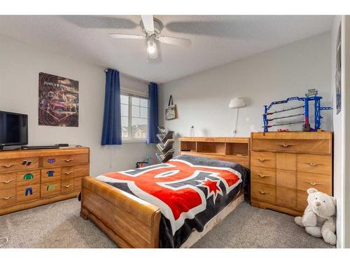 256 Oakmere Place, Chestermere, AB - Indoor Photo Showing Bedroom