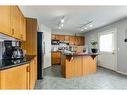 256 Oakmere Place, Chestermere, AB  - Indoor Photo Showing Kitchen 