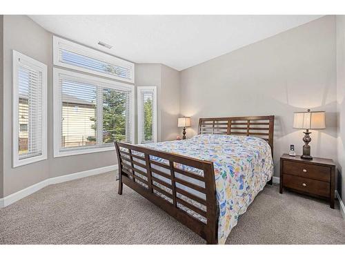 60 Cougar Ridge Landing Sw, Calgary, AB - Indoor Photo Showing Bedroom