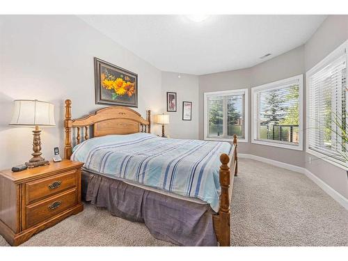 60 Cougar Ridge Landing Sw, Calgary, AB - Indoor Photo Showing Bedroom