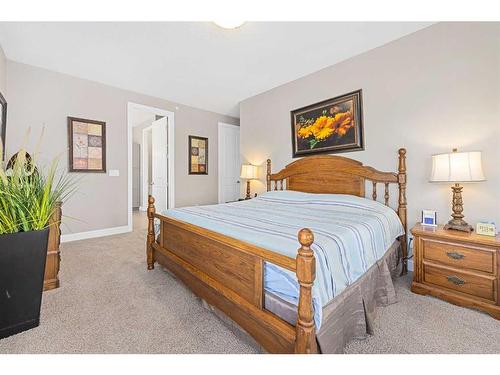 60 Cougar Ridge Landing Sw, Calgary, AB - Indoor Photo Showing Bedroom