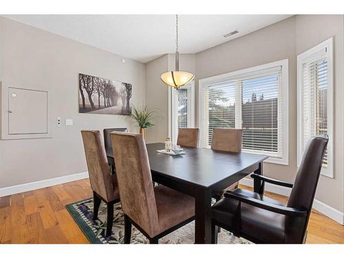 60 Cougar Ridge Landing Sw, Calgary, AB - Indoor Photo Showing Dining Room