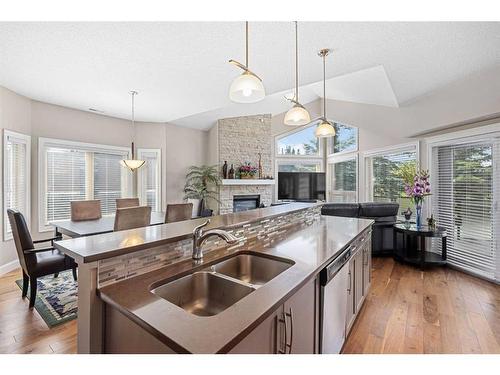 60 Cougar Ridge Landing Sw, Calgary, AB - Indoor Photo Showing Kitchen With Double Sink