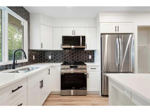 5731 Dalhousie Drive Nw, Calgary, AB - Indoor Photo Showing Kitchen With Double Sink With Upgraded Kitchen