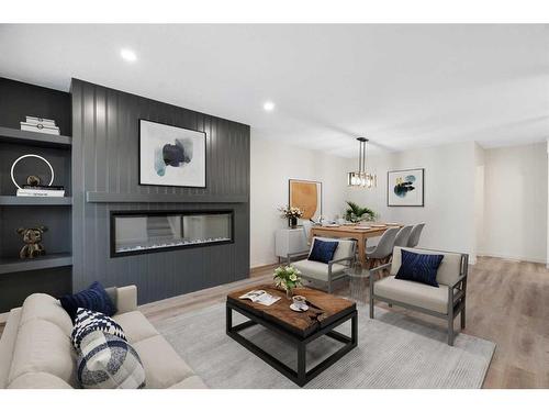 5731 Dalhousie Drive Nw, Calgary, AB - Indoor Photo Showing Living Room With Fireplace