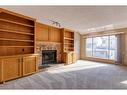 105 Hawkdale Circle Nw, Calgary, AB  - Indoor With Fireplace 