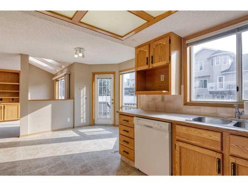 105 Hawkdale Circle Nw, Calgary, AB - Indoor Photo Showing Kitchen With Double Sink