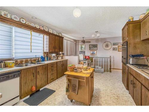 163052 Hwy 845, Rural Vulcan County, AB - Indoor Photo Showing Kitchen With Double Sink