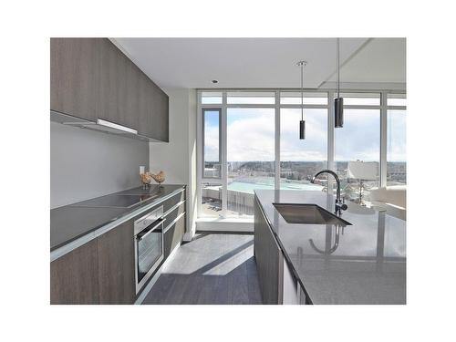 1409-1188 3 Street Se, Calgary, AB - Indoor Photo Showing Kitchen