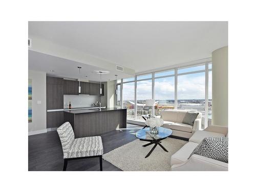 1409-1188 3 Street Se, Calgary, AB - Indoor Photo Showing Living Room