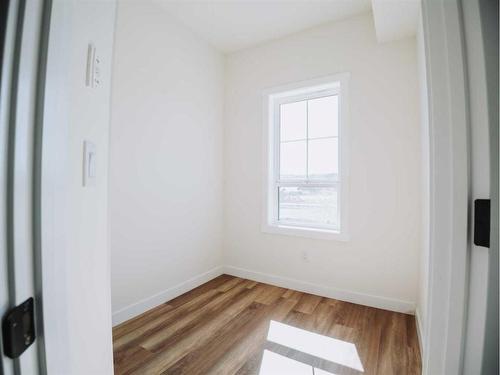 305-156 Park Street, Cochrane, AB - Indoor Photo Showing Other Room